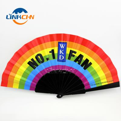 China China Rainbow Fabric Folding Plastic Hand Fan With Your Design for sale