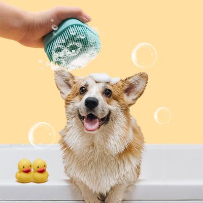 China Sustainable Amazon hot selling Soft Silicone Pet Cat Dog Grooming Massage Shampoo Bath Brush with Shampoo Container for sale