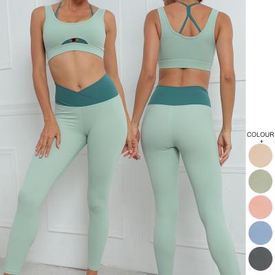 China Breathable Fashion Workout Running Gym Clothes 2 Piece Sports Set Women Fitness Crop Top Yoga Set for sale