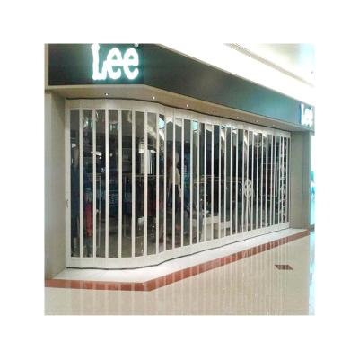 China Durable Polycarbonate Commercial Transparent Sliding Folding Doors For Shop for sale