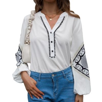 China Anti-wrinkle Women's Clothing Women's V-neck Bell Sleeve Top Straight Geometric Print Loose Long Sleeve Shirt for sale