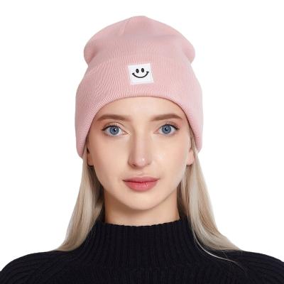 China Fashion Knitted Warm Winter Hat for Women Embroidered Smiley Face 100% Soft Acrylic Beanie Hat for sale