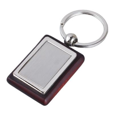 China Custom LOGO design promotion business gift rectangle shape blank wooden keychain with Metal Te koop