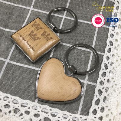 China Custom Wholesale Pendant Rectangle Heart Square Round  Wood Blank Metal  Wooden Keychain For Gift Te koop