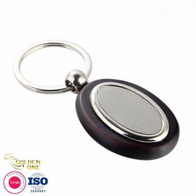 Cina Hot Sale Custom design customized laser logo keyring  promotion business gift blank Metal wooden keychains in vendita