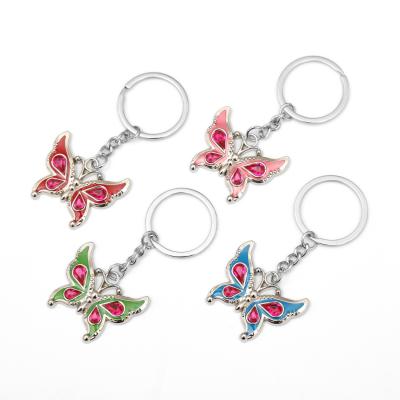 China Fabricantes suministrar diseñador creativo suave esmalte animal mariposa metal zinc de aleación llavero en venta