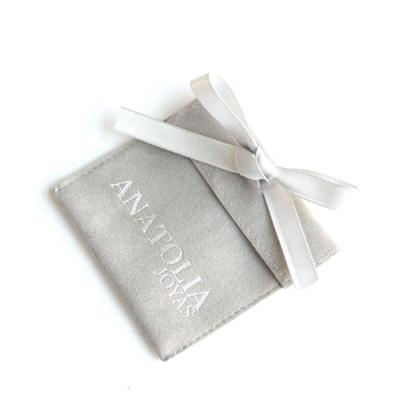 China Eco - Friendly Custom Small Silver Foiled Logo Jewelry Envelope Flap Pouch With Ribbon Tie for sale