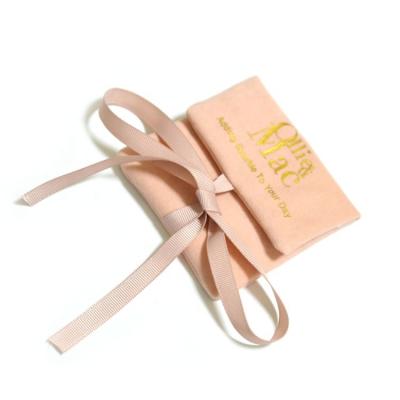 China Custom Size Cotton Color Logo Faux Suede Wrap Jewelry Pouch With Insert for sale