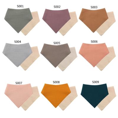 China Baby Drool Accessories Cotton Bibs Snap Solid Color Button Viable Triangle Soft Towel Baby Drool Feeding Bibs for sale