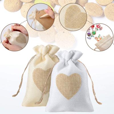 China Small Eco-Friendly Heart Jute Drawstring Pouch Nice Canvas Bag For Wedding for sale