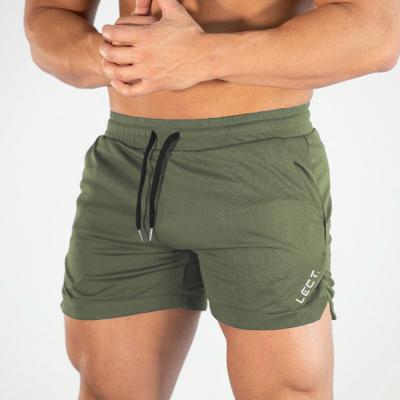 China Anti-Wrinkle Lightweight Mens White Shorts Hot Shorts Running Jogger Stretch Fabrics Gym Fitness Quick Dry Shorts With Pockets for sale