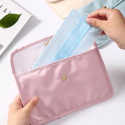 China Viable Portable Waterproof Foldable Cloth Organizer Cloth Case Face Mask Storage Packaging Bag for sale