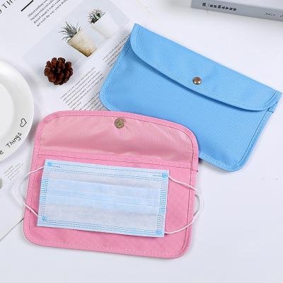 China Portable Waterproof Collapsible Cloth Cloth Pouch Organizer Face Mask Packaging Storage Bag for sale