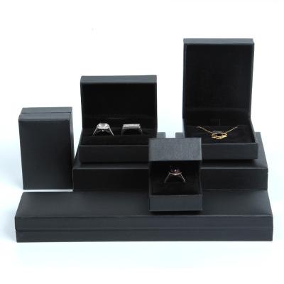 China Custom Leatherette Paper Ring Box Logo Jewelry Box Packaging Gift Classic Jewelry Packaging Box Wholesale for sale