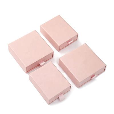 China Recyclable Luxury Customize Pink Cardboard Sliding Drawer Paper Boxes Ring Pendant Jewelry Box for sale