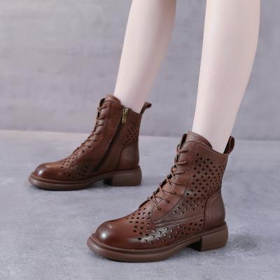 China Cushioning 2023 Summer Women's Sandals Leather Trim Sole Hollow Shorts Soft Reject Cowhide Martin Boots Hole Cool Women's Boots for sale