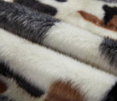 China Attractive Unique Auto Upholstery Long Pile Jacquard Stripe Design Plush Faux Fur Fabric for sale