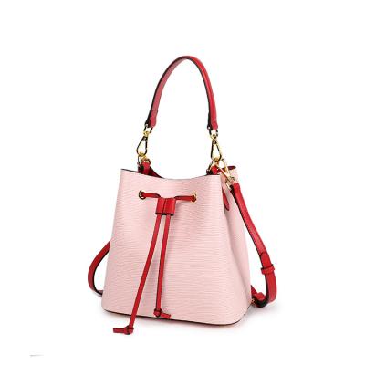 China Fashion Women's Shoulder Bucket Bag 2021 New Fashionable Large Capacity Genuine Leather Women's Water Ripple Bag Fashion Basket Bag for sale