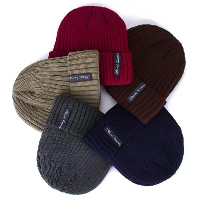 China JOINT Label Winter Beanie Cap Thick Knitted Woven Warm Hats for sale