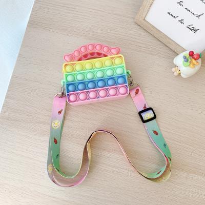 China New Lightweight Rainbow Silicone Mini Popping It Bag Kids Boobies Toys Pack Bubble Cross Jumping It - Body Bag for sale