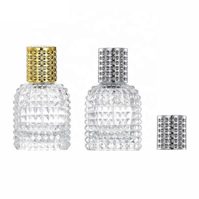 China 50ml Cosmetic Pineapple Shape Empty Glass Perfume Bottle With Gold Or Silver Pump Sprayer for sale