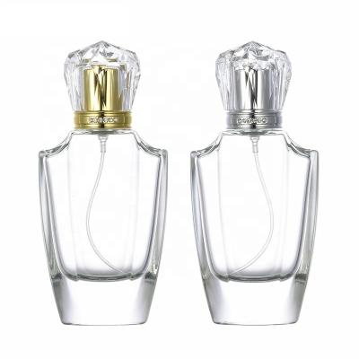 China Wholesale Cosmetic Unique Shape Empty Glass Bottling Perfume With Cap 50ml for sale