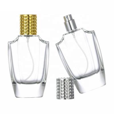 China Cosmetic luxury refillable shape empty glass perfume bottle 50ml with pineapple shape cap for sale