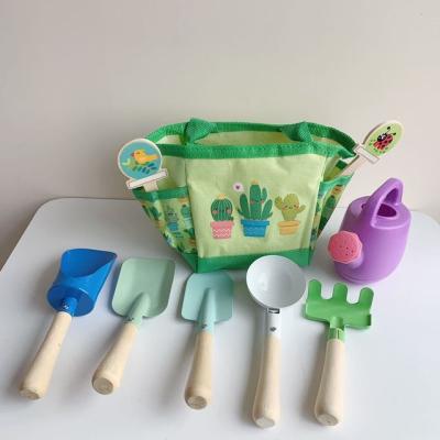 China Kitchen Toy Set 8pcs Metal Beach Garden Tool With Sack Shovel Spoon Rake Pretend To Play Beach Sand Toy Wooden Set for sale