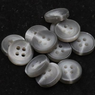 China Viable High Quality Custom Made Plastic Resin Buttons White Black Shirt 4 Hole Buttons For Clothing for sale