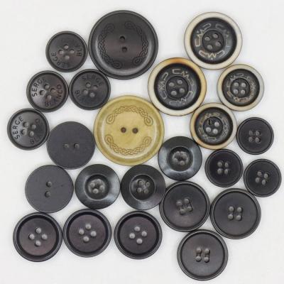 China Freewashable Gongmei Art Design custom nickel viable laser engraved black natural corozo buttons for sale