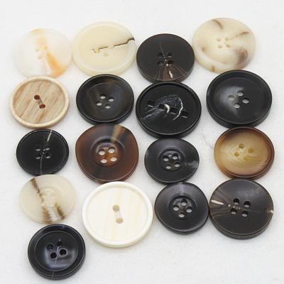 China Viable Customize Various Sizes Of Irregular Resin Plastic Buttons Clothing Accessories Coat DIY Accessories for sale