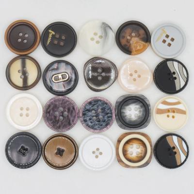 China Viable Wholesale Custom Made High-Grade Resin Four-hole Button Plastic Coat Buttons for sale