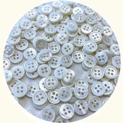 China Viable Custom Wholesale Laser Engraved Logo 4 Hole White River Shell Button for sale