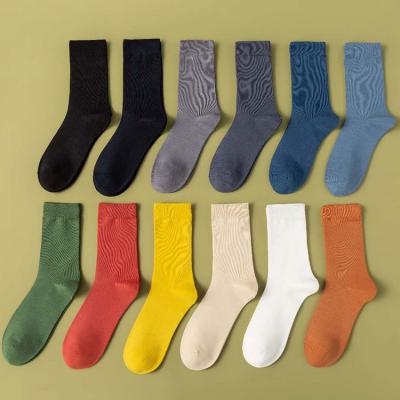 China 100% Black White Soft Crew Dress Solid Color Cotton Running Colorful Sporty Casual Socks Men's Crew Socks for sale