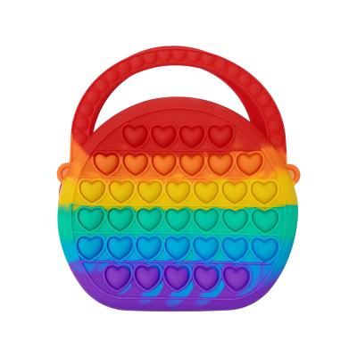 China Funny Educational Toy Rainbow Pop Purse for Girls Cross - Body Pop Bag Over Shoulder Bags Wiggle Purse Toys Push Bubble Relieve Stress Purses for sale