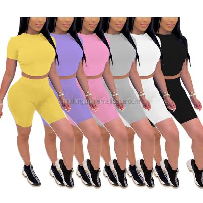 China QUICK DRY women's sportswear fashion solid color sexy short sleeve crop top tight shorts two-piece tracksuit for sale