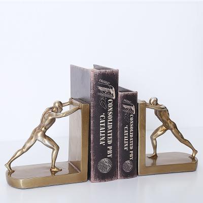 China Creative Europe Sports Man Resin Bookends Decorative for Office Retros Gold Table Abstract Ornaments for sale