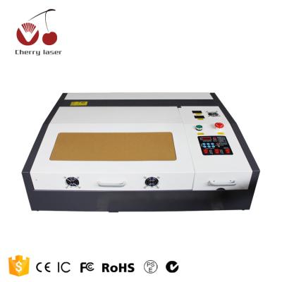 China Laser Engraving Mini Laser Engraving Machine 4040 50w for Cutting Stones/Glass/Acrylic/Crystal/Rubber for sale