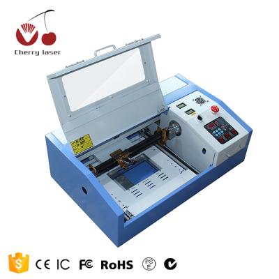 China Laser Engraving High Cost Performance Large Features 40W Desktop CO2 Laser Engraving Machine 3020 for sale