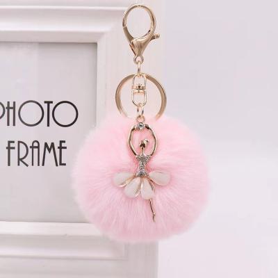 China Cute Promotion Gift Small Faux Fur Key Chain Angel Car Key Chain Women Trinket Car Bag Key Ring Jewelry Gift Fluff Keychains for sale