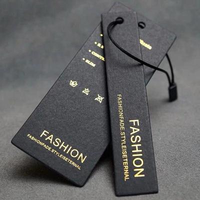 China Recyclable Custom Swing Hang Paper Tag Labels Price Tag For Clothes Garment Apparel Hang Tags Printing for sale