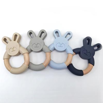 China Soft Toy Food Grade Baby Toy Silicone Rabbit Wooden Rabbit Teether Teether Wholesale for sale