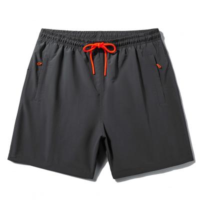 China 2022 New Arrived QUICK DRY Waterproof Fabric Beach Shorts With Logo Fitness Sport Sprint Men Shorts Custom Made Zipper Pockets The Wide for sale