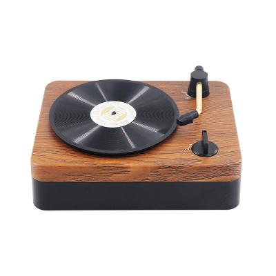 China Wireless Charger for Mini Speaker Retro Gramophone Record Wireless Portable Desktop Audio Wooden Retro Cell Phone Speaker for sale