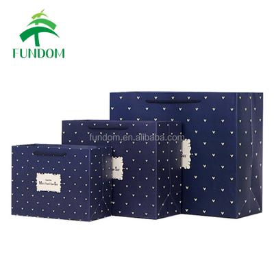 China Recyclable Custom Dark Blue Matte Color Lamination Cheap Paper Foldable Shopping Bag for sale