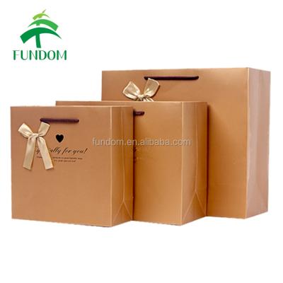 China Retail Recyclable 4 Sizes Retail Printing Paper Full Copper Luxury Shopping Bag Distribution Stock Available With Ribbon Bowknot for sale