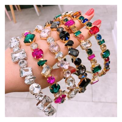 China Newest style bling headband full of luxury wholesale European and American faux stone crystal loose headband for women for sale