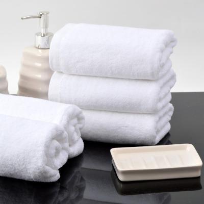 China QUICK DRY Custom Four Seasons Logo Embroidery White 100% Hand Towels Cotton Hotel Towels for sale