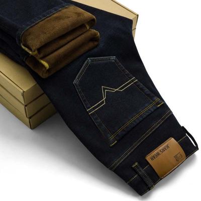 China 2021 New Breathable Men's Activities Warm Autumn Winter Jeans High Quality Famous Brand Flocking Soft Men's Jeans Shear Velvet for sale