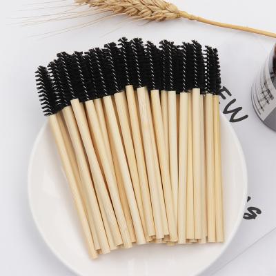 China Bamboo Handle Disposable Nylon Mascara Wands Eyelash Brush With Bamboo Handle for sale